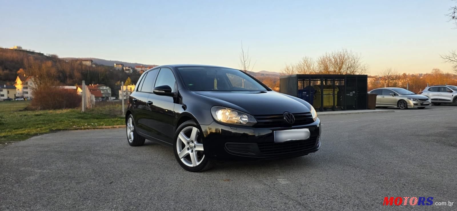 2009' Volkswagen Golf VI 1,6 photo #2