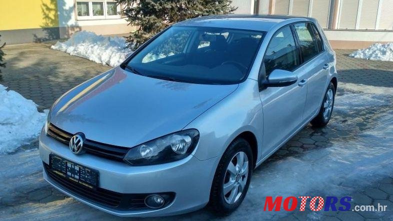 2012' Volkswagen Golf VI 1,6 Tdi photo #1