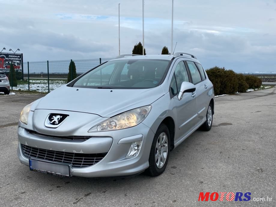 2011' Peugeot 308 Sw photo #1