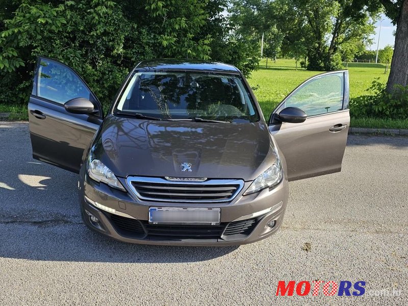 2014' Peugeot 308 Sw photo #1