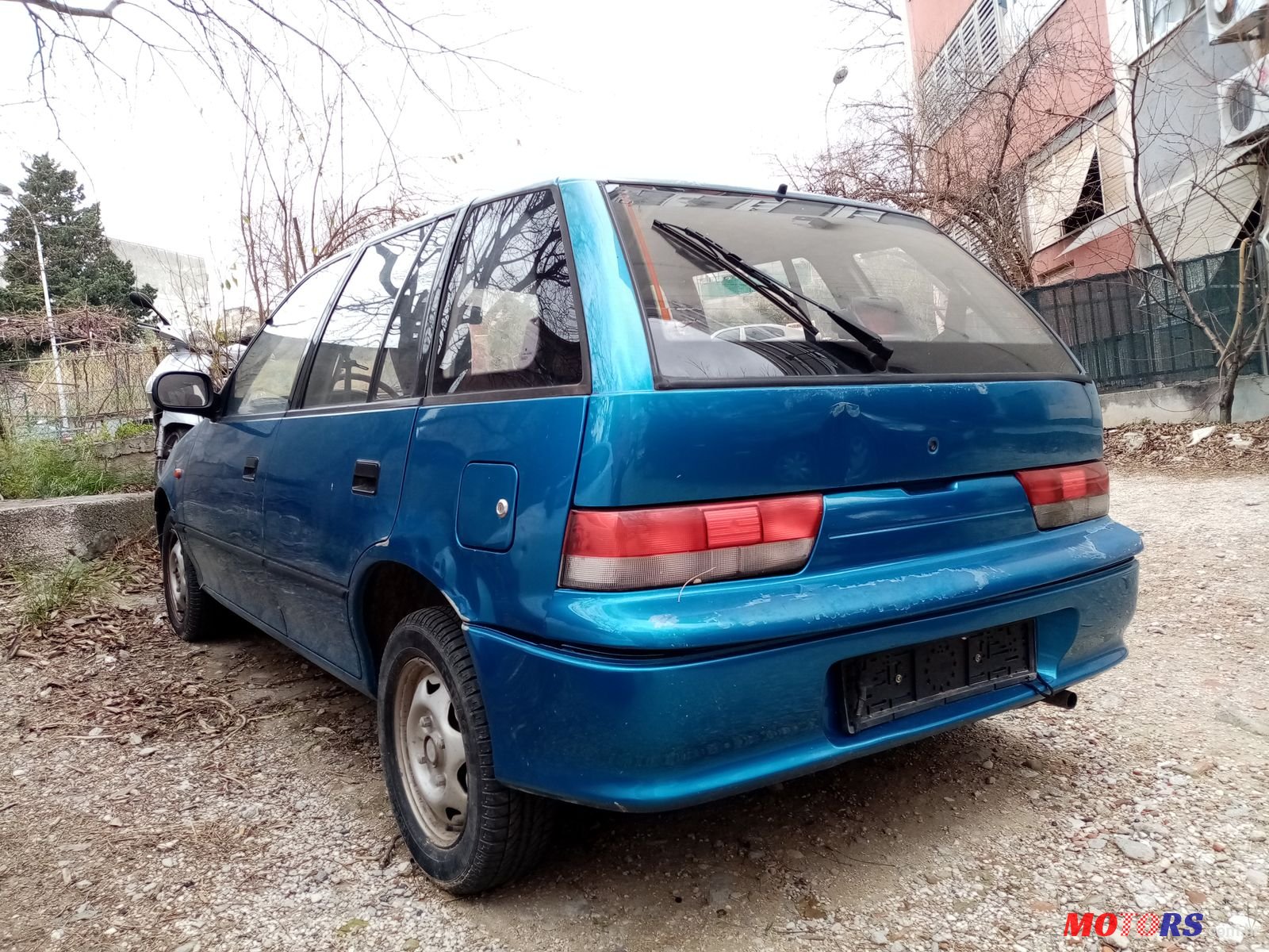 2000' Suzuki Swift photo #1