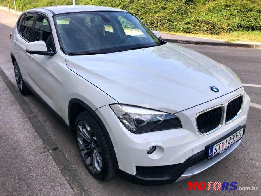 2015' BMW X1 16D photo #1