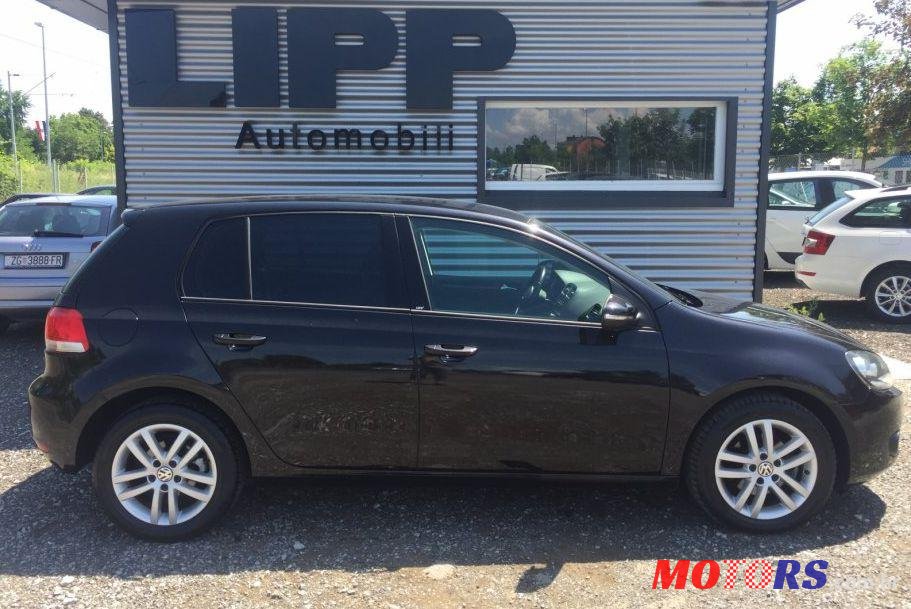 2010' Volkswagen Golf VI 1,6 Tdi photo #1