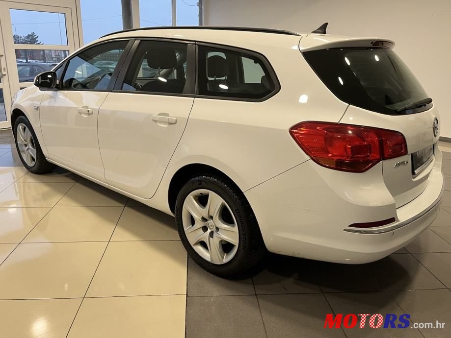 2014' Opel Astra Karavan photo #6