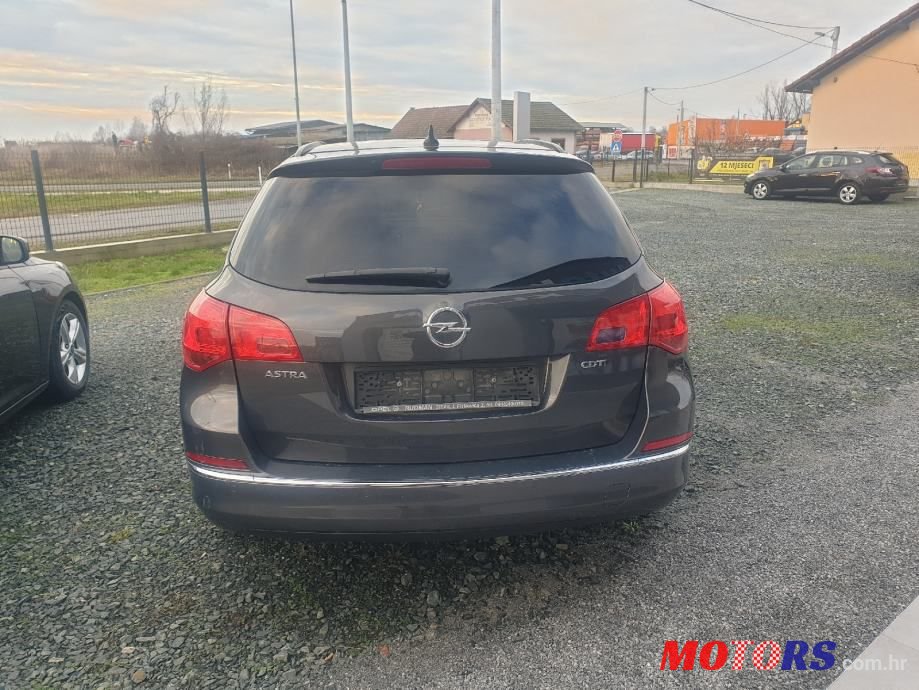 2014' Opel Astra Karavan photo #6