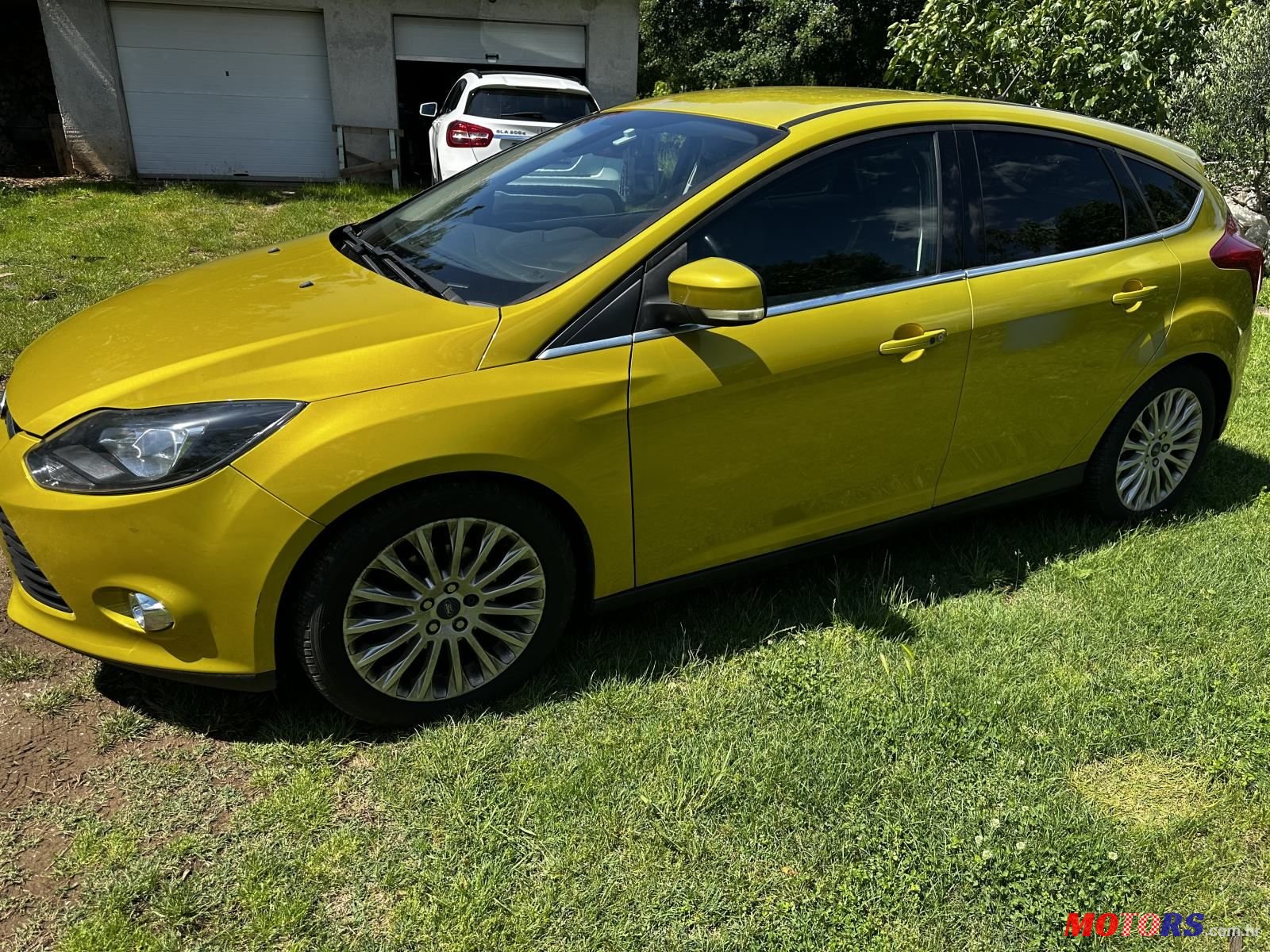 2011' Ford Focus 1,6 photo #3