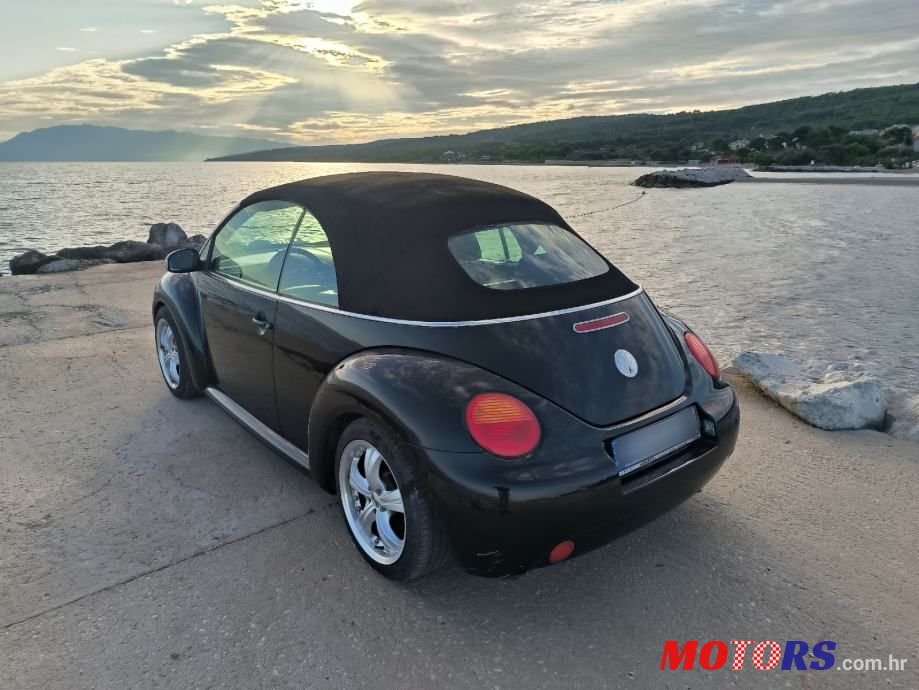 2004' Volkswagen Beetle 1,4 photo #1