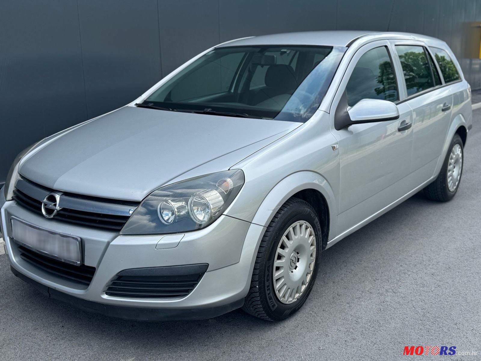 2006' Opel Astra Karavan photo #1