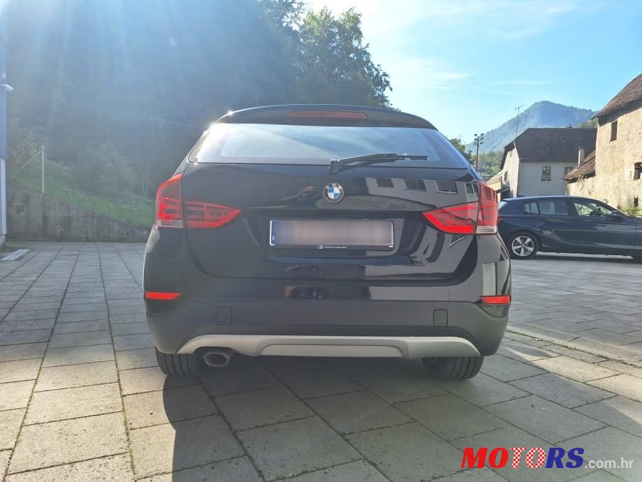 2013' BMW X1 Sdrive18D photo #4