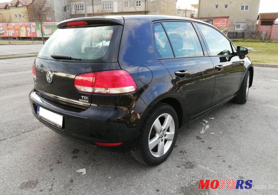 2012' Volkswagen Golf VI 1,6 Tdi photo #1