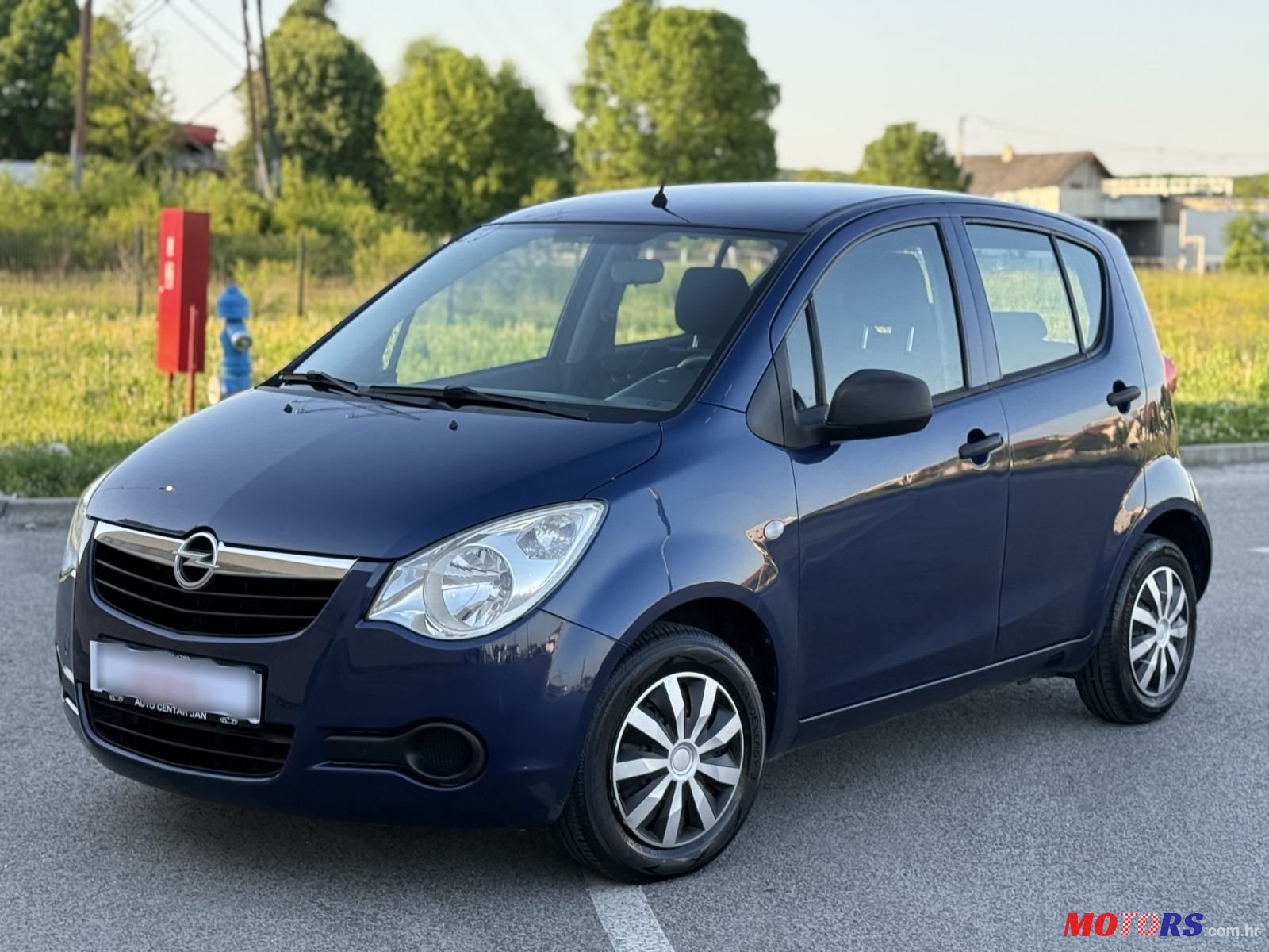 2009' Opel Agila 1,0 photo #3