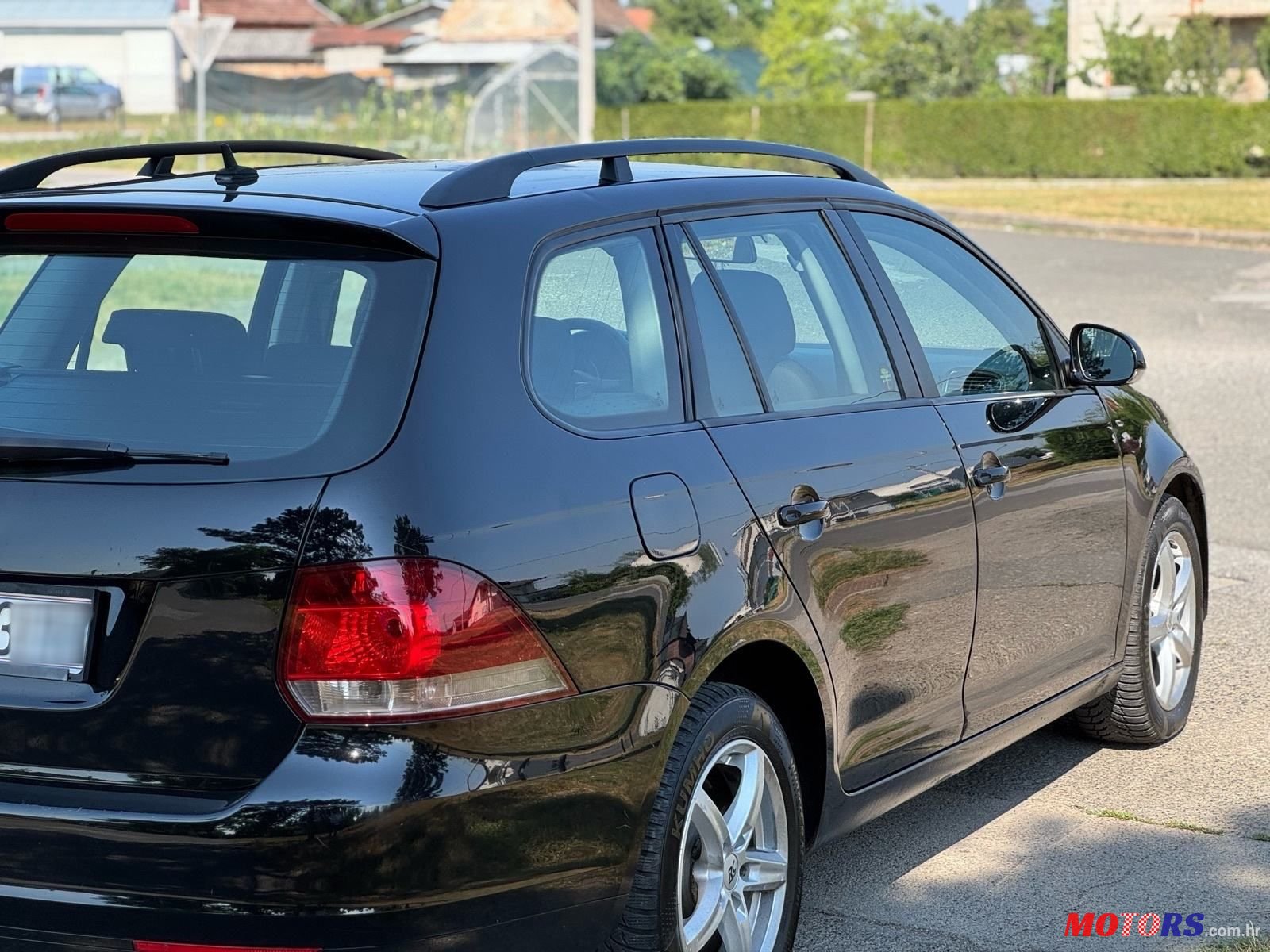 2011' Volkswagen Golf VI Variant photo #6