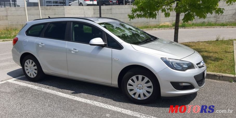 2015' Opel Astra Karavan photo #1