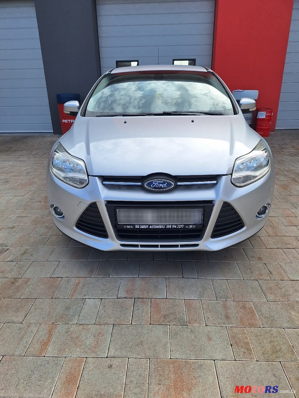 2013' Ford Focus 1,6 Sport photo #1