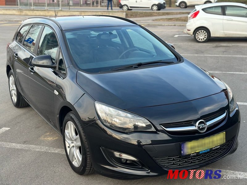 2015' Opel Astra Karavan photo #2