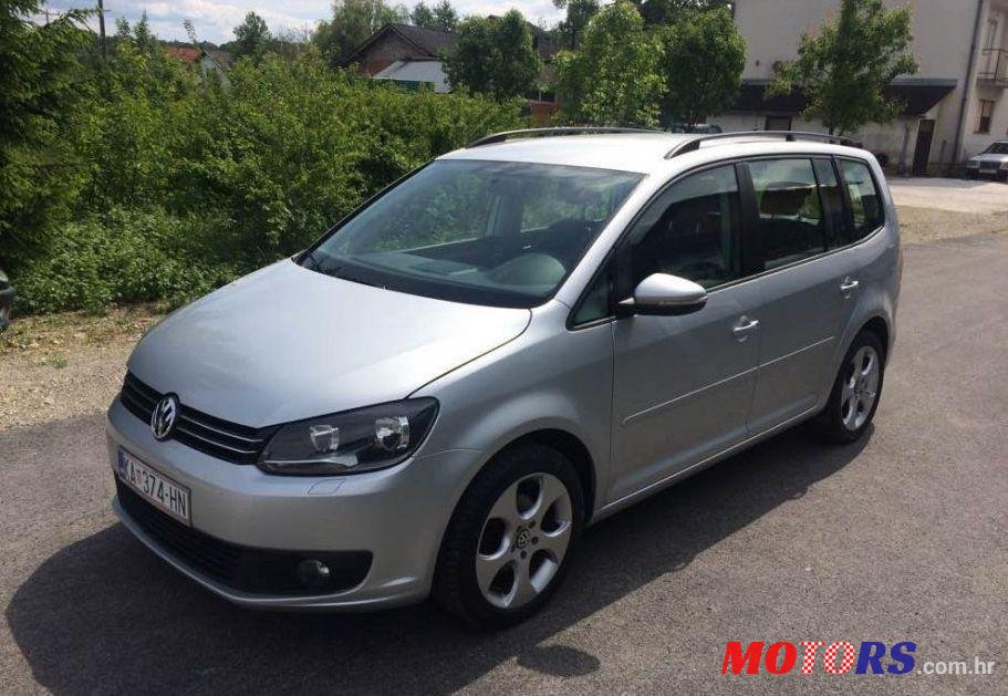 2013' Volkswagen Touran 1,6 Tdi photo #1