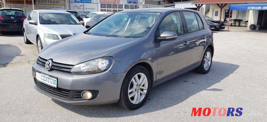 2011' Volkswagen Golf VI 1,6 Tdi photo #1
