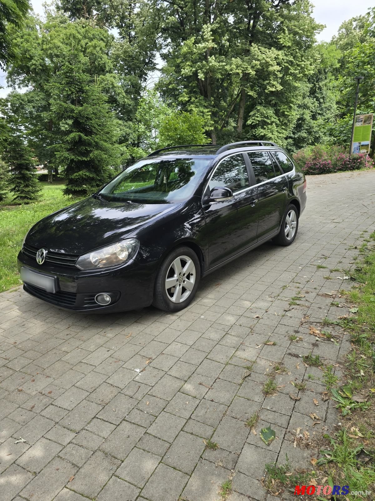 2011' Volkswagen Golf VI Variant photo #1