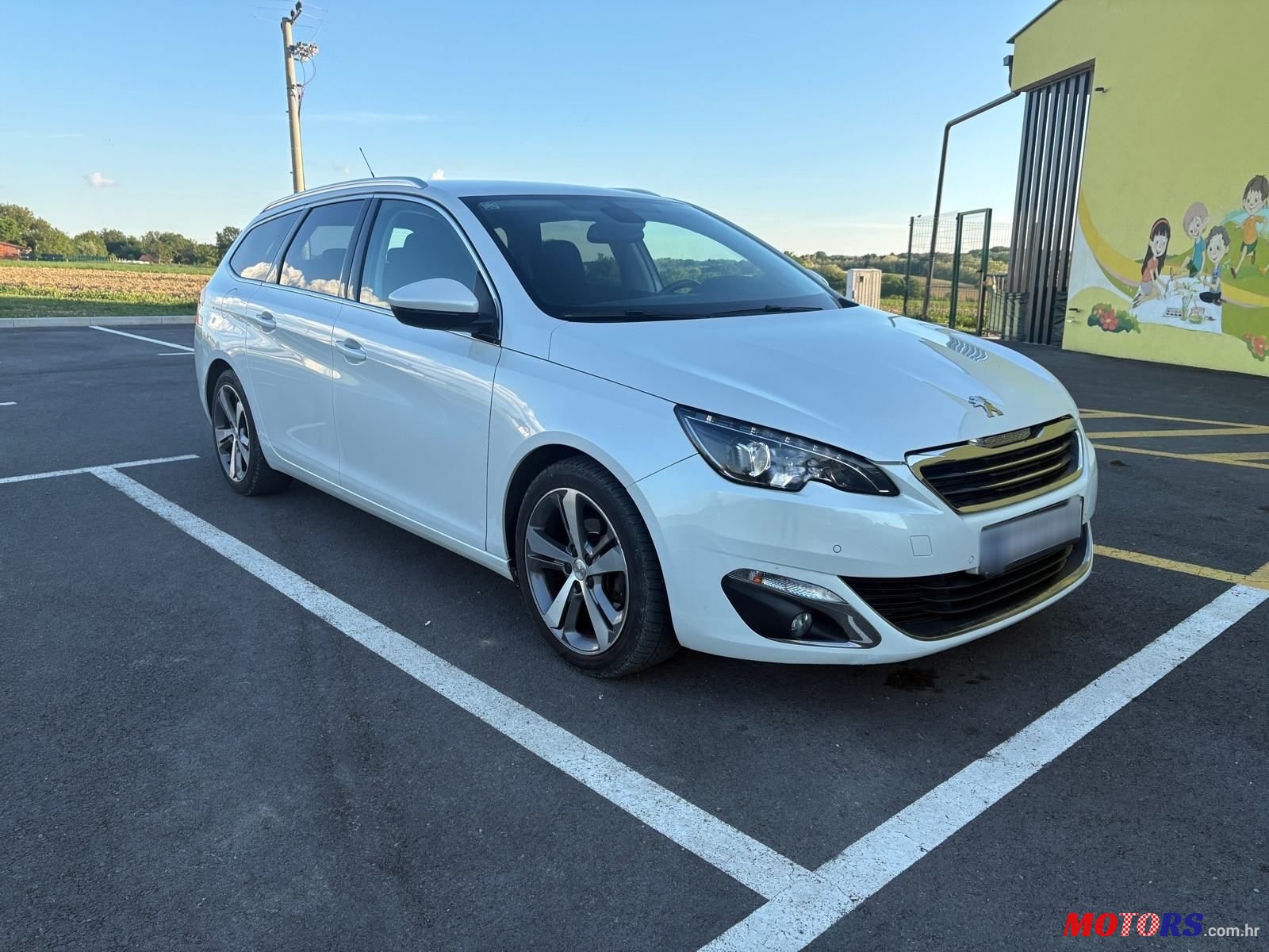2016' Peugeot 308 Sw photo #1