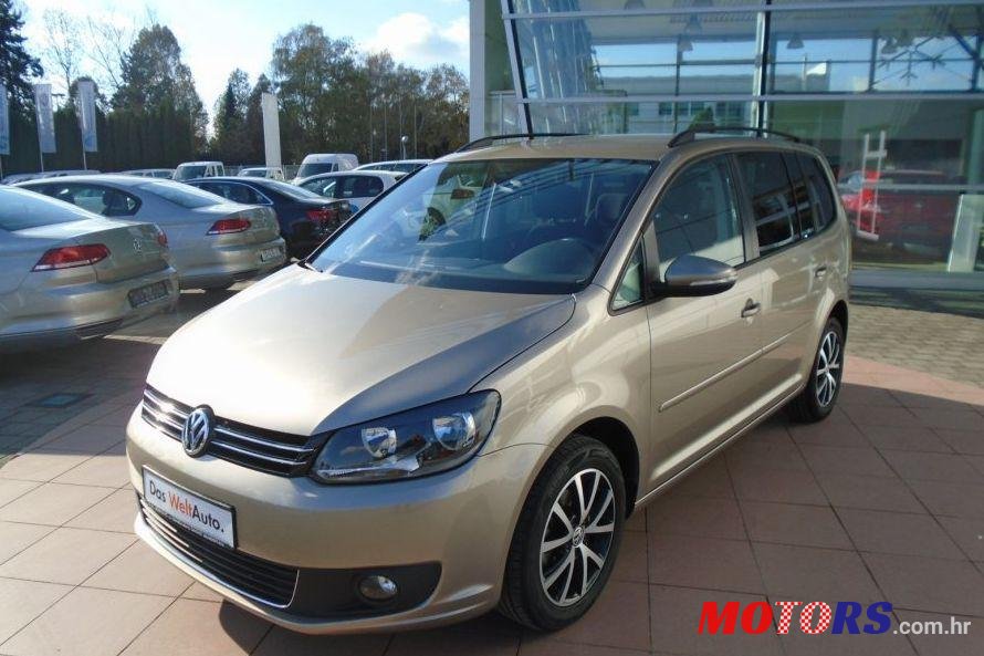 2014' Volkswagen Touran 1,6 Tdi photo #1