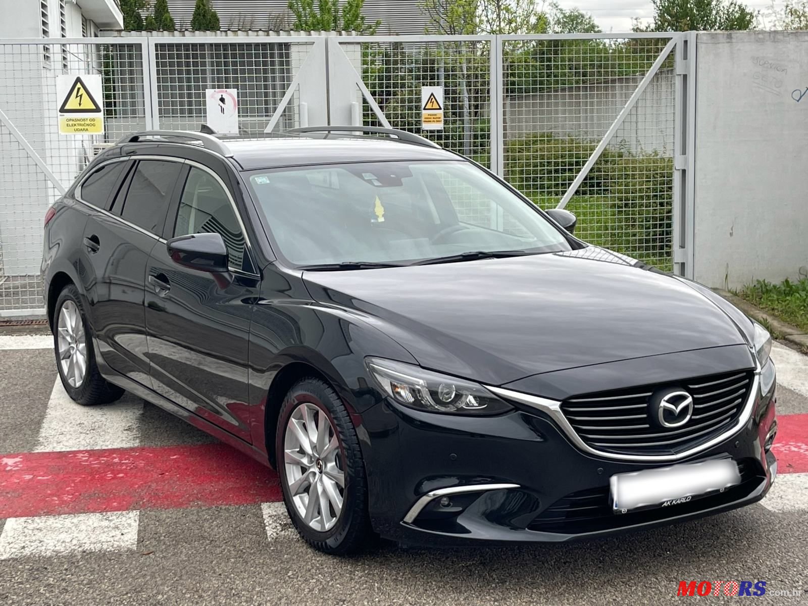 2015' Mazda 6 Sport Combi photo #3