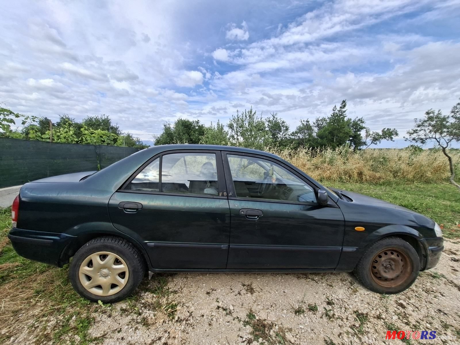 1999' Mazda 323 1.3 Ce 4T photo #4