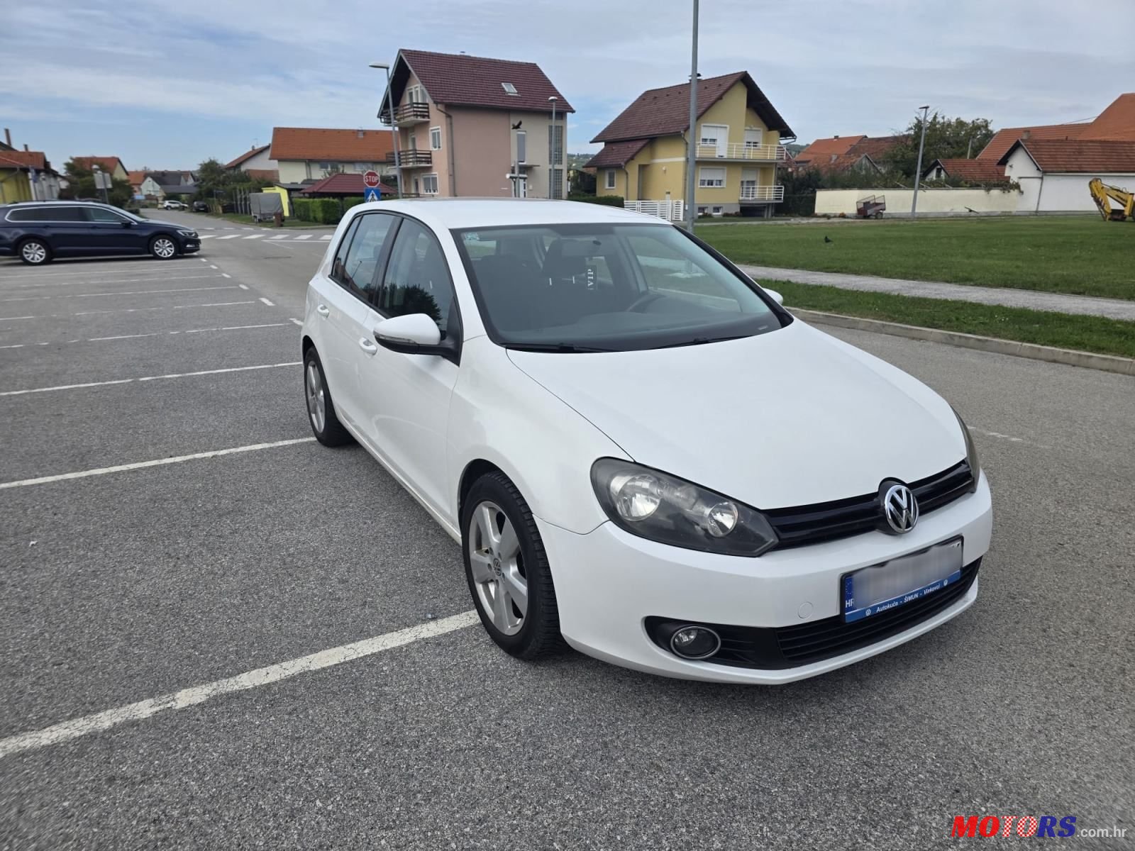 2011' Volkswagen Golf VI 1,6 Tdi photo #3