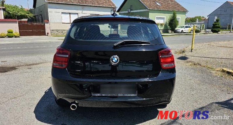 2014' BMW Serija 1 116D photo #6