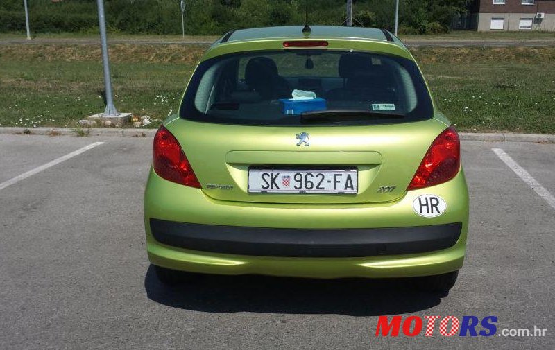 2008' Peugeot 207 1,4 photo #1