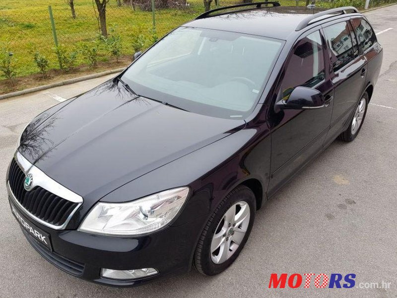 2013' Skoda Octavia Combi 1,6 Tdi photo #1