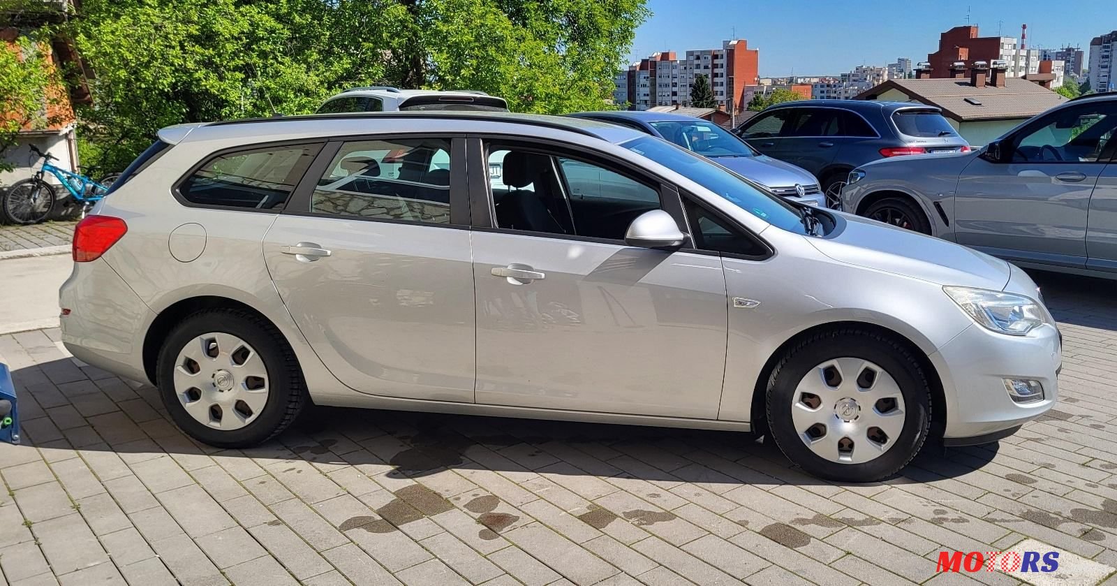 2011' Opel Astra Karavan photo #4