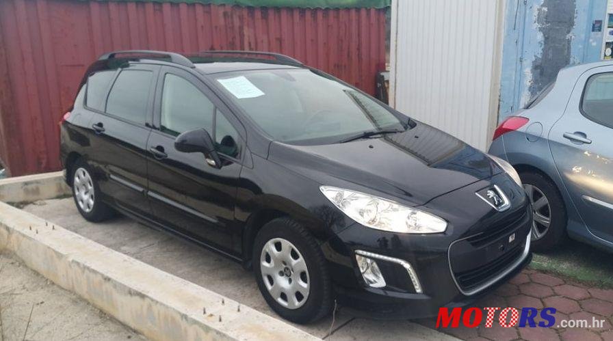 2014' Peugeot 308 Sw 1,6 Hdi photo #2