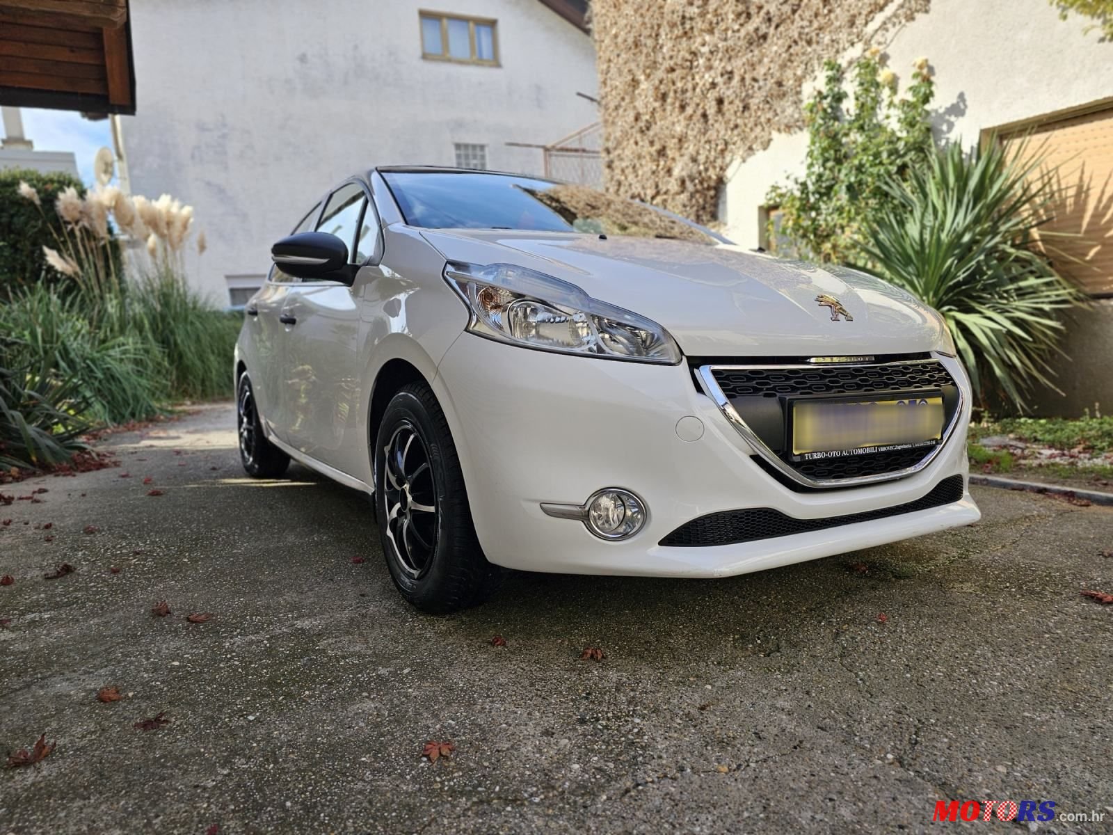 2013' Peugeot 208 1,0 Vti photo #1
