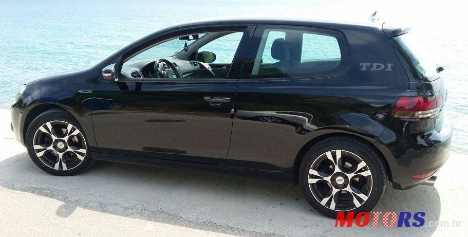 2011' Volkswagen Golf VI 1,6 Tdi photo #2