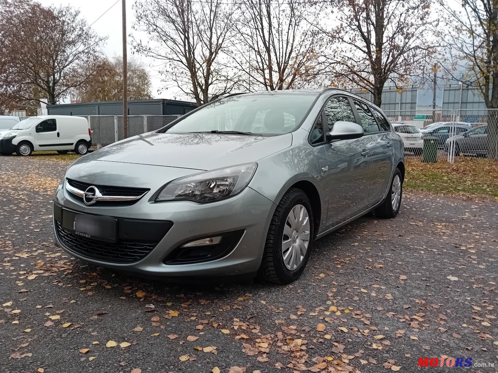 2014' Opel Astra Karavan photo #1