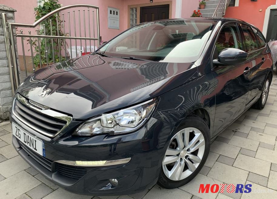 2014' Peugeot 308 Sw photo #1