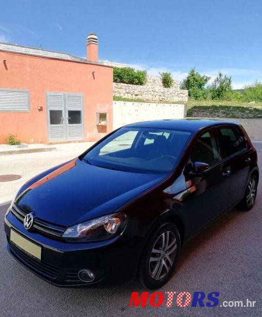 2011' Volkswagen Golf VI 1,6 Tdi photo #1