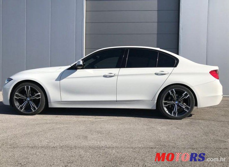 2013' BMW Serija 3 318D photo #1