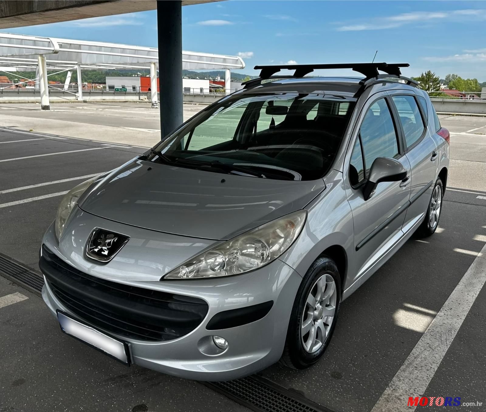 2009' Peugeot 207 Sw photo #1