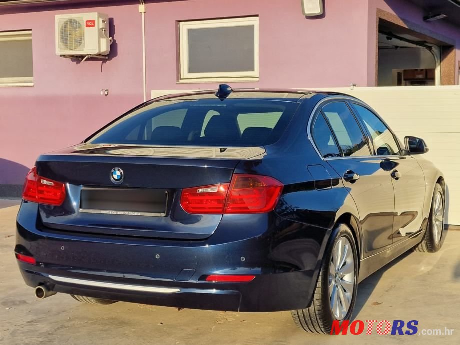 2014' BMW Serija 3 318D photo #6