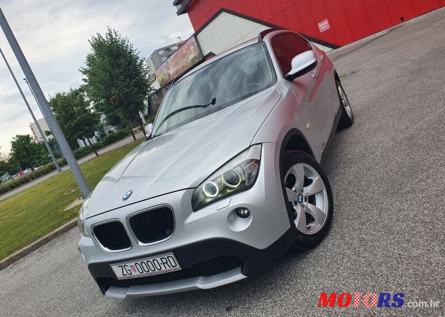 2011' BMW X1 Xdrive20D photo #1