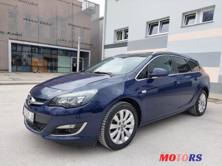 2015' Opel Astra Karavan photo #1