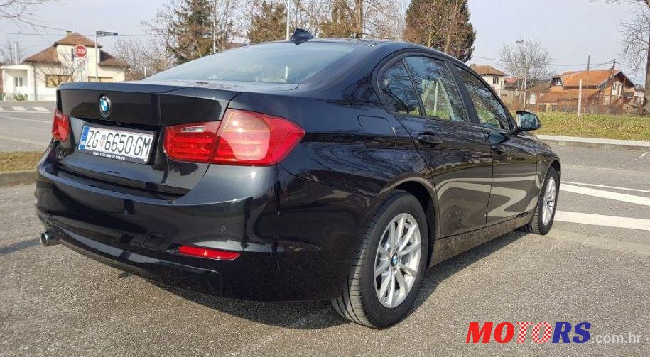 2013' BMW Serija 3 318D photo #1