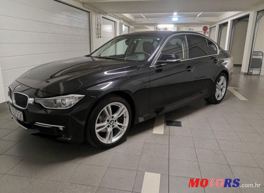 2014' BMW Serija 3 318D photo #1