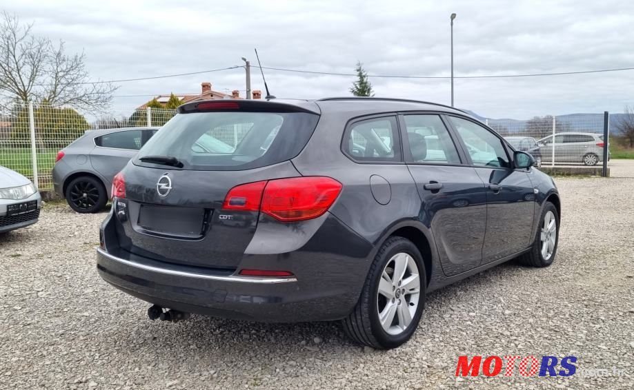 2014' Opel Astra Karavan photo #5