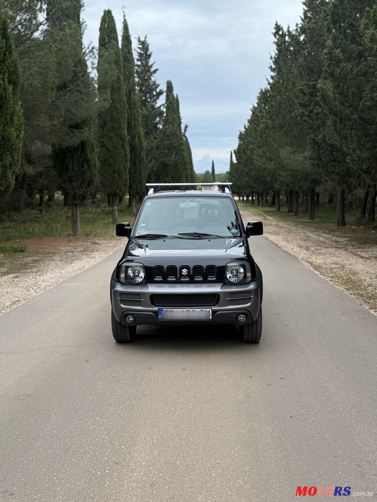 2006' Suzuki Jimny 1,3 Jlx photo #5
