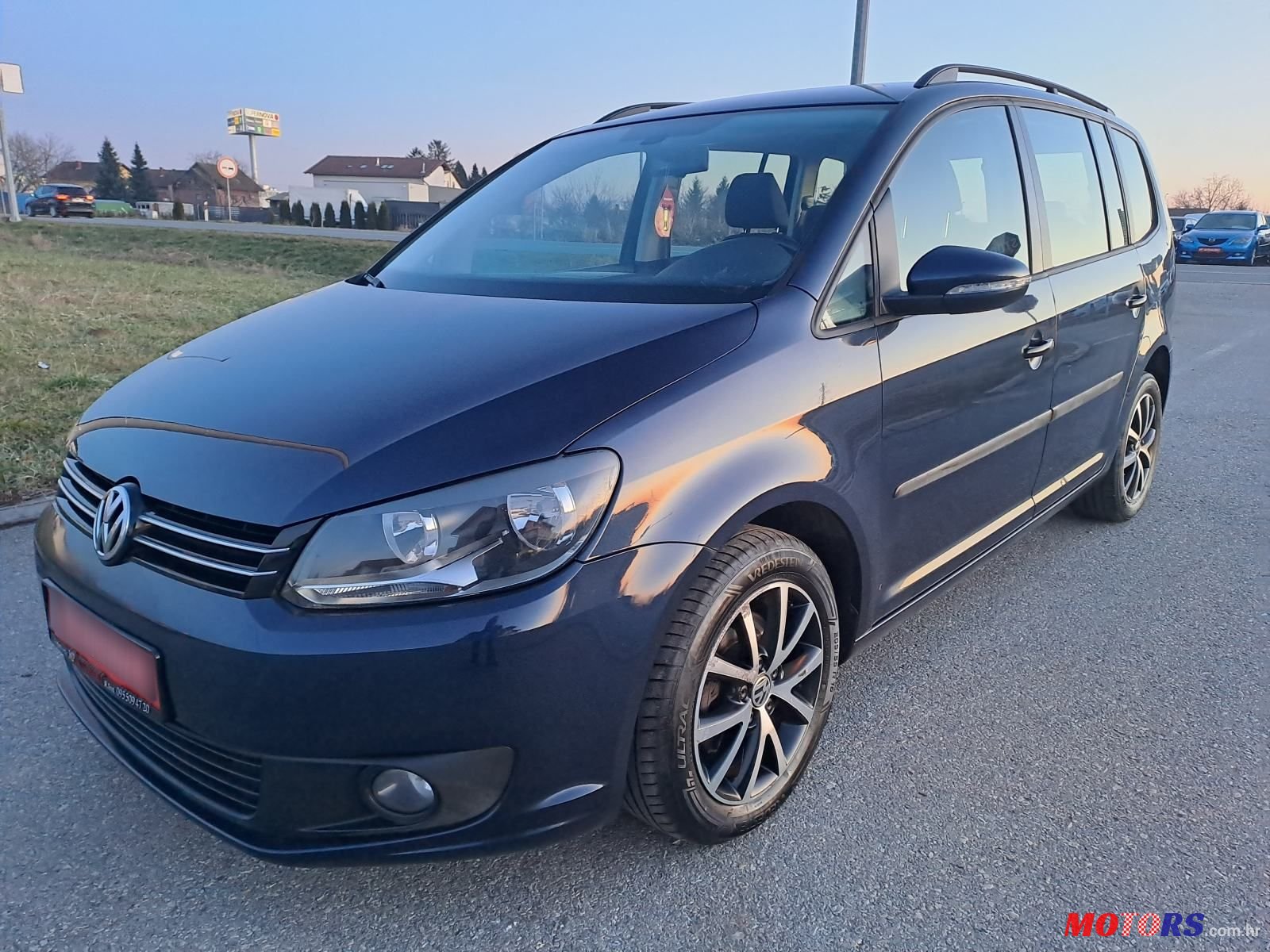 2014' Volkswagen Touran 1,6 Tdi photo #1