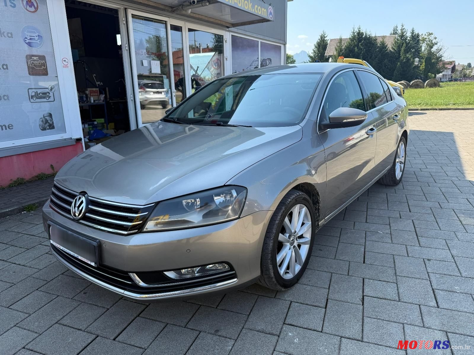 2012' Volkswagen Passat 1,6 Tdi photo #1