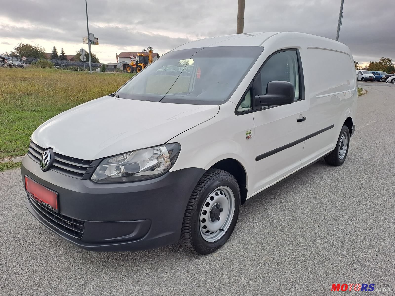 2012' Volkswagen Caddy 1,6 Tdi photo #1
