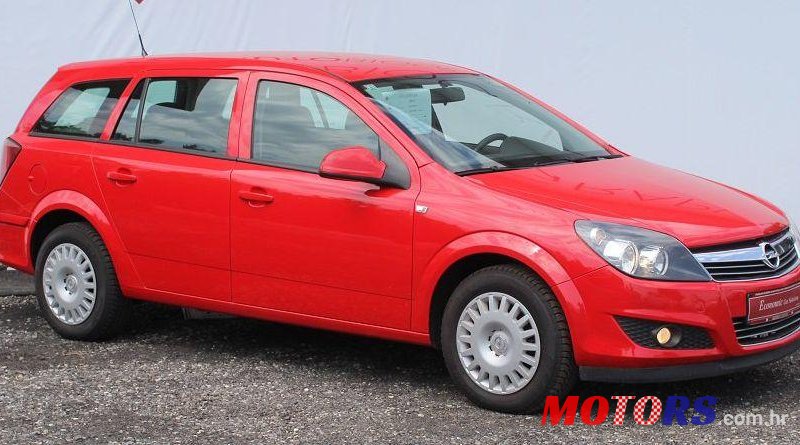 2011' Opel Astra Karavan photo #2